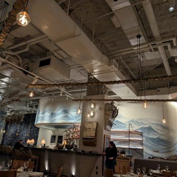 Fish Shop - Beautiful interior with hand made fish hanging from the ceiling and textured wave walls. - Seafood Near Me - Washington, DC, District of Columbia