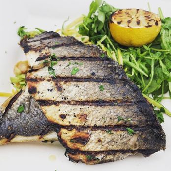 Anchor Down Dockside - Grilled branzino with zoodles - Seafood Near Me - Seaford, New York Anchor Down Dockside - Grilled branzino with zoodles - Seafood Near Me - Seaford, New York