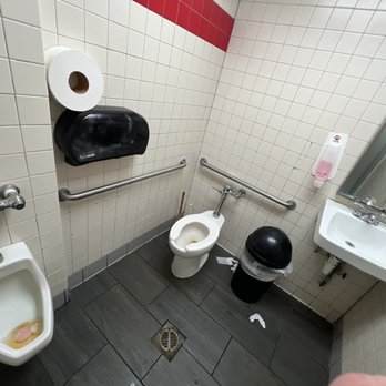 Krystal - a bathroom with a toilet, urinal and sink - Burgers Near Me - Southaven, Mississippi Krystal - a bathroom with a toilet, urinal and sink - Burgers Near Me - Southaven, Mississippi