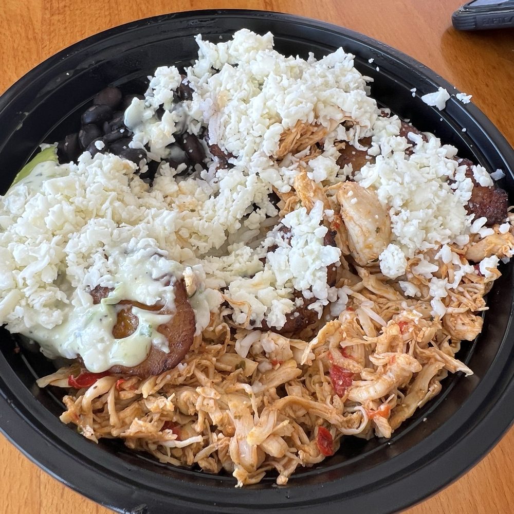 1Chick 1Bro Cafe Bistro - Venezuelan Criollo Bowl with chicken. The rice was delicious! - Venezuelan Near Me - Gulfport, Florida