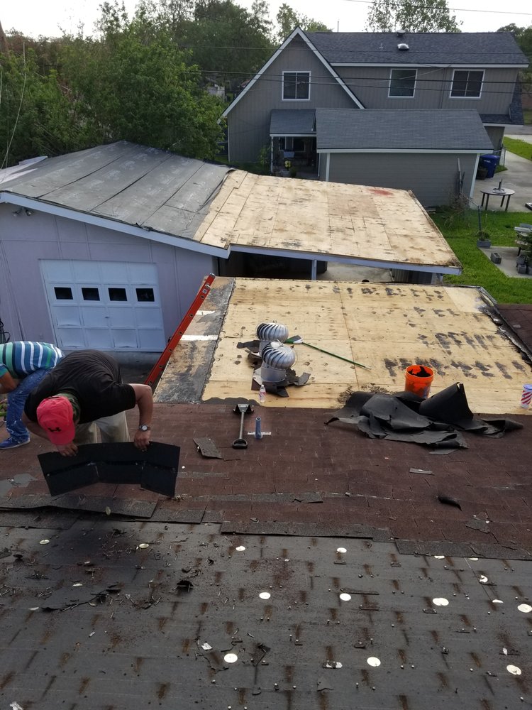 Slide of Vela's Roofing and Construction