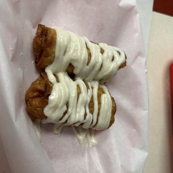 Guud & Evul Vegan Eats - 14. Crack Roll Apple cobbler egg rolls, deep fried and topped with vanilla bean icing - New American Near Me - Tonawanda, New York Guud & Evul Vegan Eats - 14. Crack Roll Apple cobbler egg rolls, deep fried and topped with vanilla bean icing - New American Near Me - Tonawanda, New York