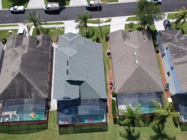 Slide of RC Roofing Florida
