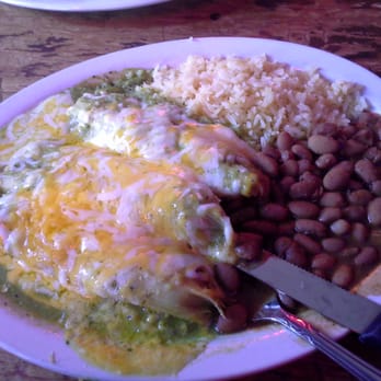 Texas Chili Parlor - The pork tamale with green chile plate.  Delish. - American Near Me - Austin, Texas