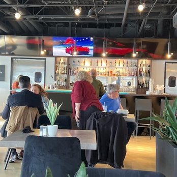Stingray Grill - Facing the bar, cool video visuals above. - American Near Me - Bowling Green, Kentucky Stingray Grill - Facing the bar, cool video visuals above. - American Near Me - Bowling Green, Kentucky