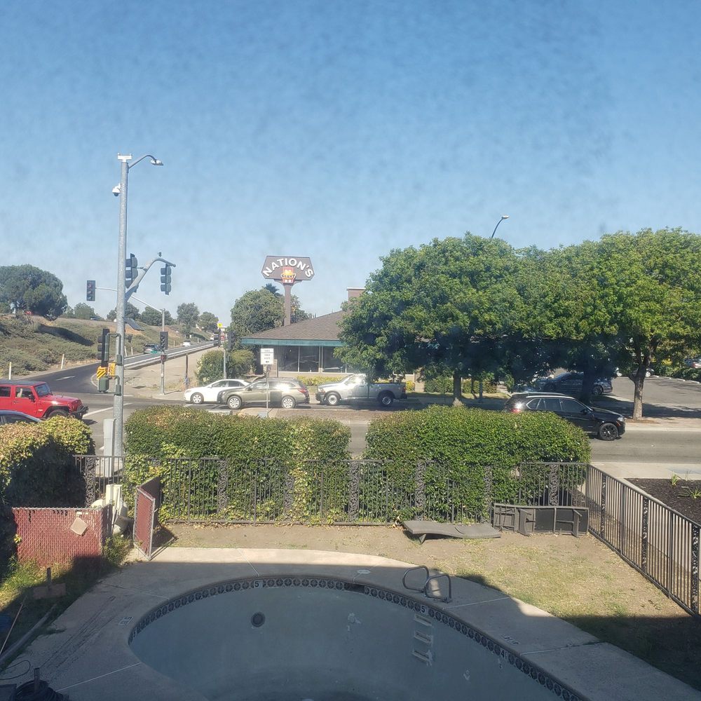 Econo Lodge - Next to the freeway, freeway off ramp, and a main street. Hotel pool. - Hotels Near Me - Tracy, California