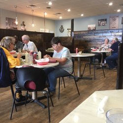 Mayo's Seafood Restaurant - Possibly recycled barn wood is used for dividers.