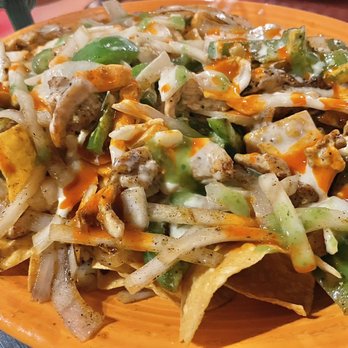 Riviera Maya - Nachos with grilled chicken (I added peppers & onions and the hot habanero sauce)! - Mexican Near Me - Indianapolis, Indiana