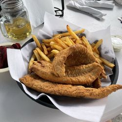 Fried Haddock with pickled beets and fries.