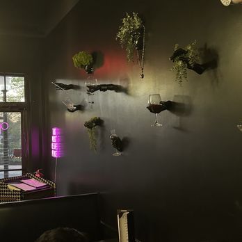 Twisted Liquid - Decorated wall - Cocktail Bars Near Me - Blacksburg, Virginia