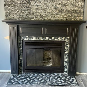 A+ Mechanicals -  a fireplace in a living room - Electricians Near Me - Champaign, Illinois