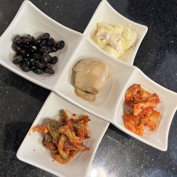 Koriander - Side dishes of kimchi and pickled dried radishes - Asian Fusion Near Me - Corvallis, Oregon