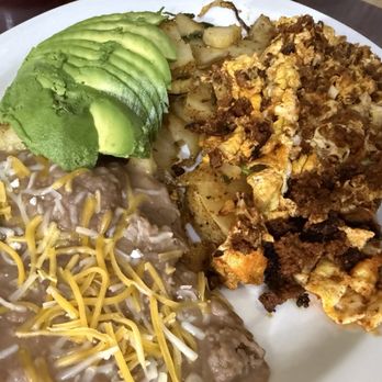 Rodeo Cafe - Chorizo scrambled eggs. Added avocado. This came with choice of tortillas or bread. - Cafes Near Me - Rancho Cucamonga, California Rodeo Cafe - Chorizo scrambled eggs. Added avocado. This came with choice of tortillas or bread. - Cafes Near Me - Rancho Cucamonga, California
