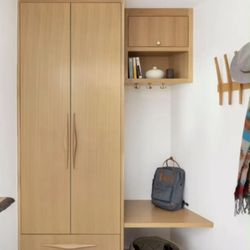 Inhabit Home Services - White oak mudroom closet, coat hanger, and floating bench