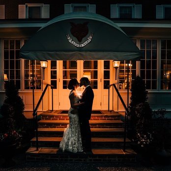 Radnor Hunt - a bride and groom standing in front of a building - Nightlife Near Me - Malvern, Pennsylvania Radnor Hunt - a bride and groom standing in front of a building - Nightlife Near Me - Malvern, Pennsylvania