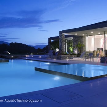 Aquatic Technology Pool & Spa - Glass tile mosaic negative edge, knife edge and perimeter overflow swimming pool and spa. - Architects Near Me Aquatic Technology Pool & Spa - Glass tile mosaic negative edge, knife edge and perimeter overflow swimming pool and spa. - Architects Near Me