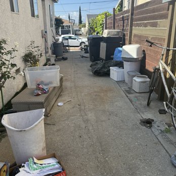 Beachside Junk Removal and Hauling - Drive way before photo - Demolition Services Near Me