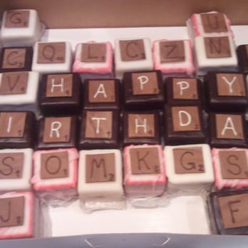 Paige's Bakehouse - Custom-designed cakes with Scrabble-looking tiles on top.  Yummy! - Bakeries Near Me - Round Rock, Texas