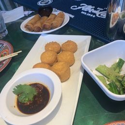 Deep fried tofu with some dipping sauce sauce egg rolls are great appetizers Deep fried tofu with some dipping sauce sauce egg rolls are great appetizers