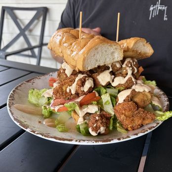 Lazy Oak - Oyster po boy with optional bread instead of biscuit. Was tasty. - Breakfast & Brunch Near Me - Ocean Springs, Mississippi