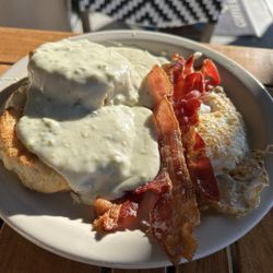 V6 Coffee Bar - Biscuits and gravy with crispy bacon and a fried egg... Reasonably priced and delicious.