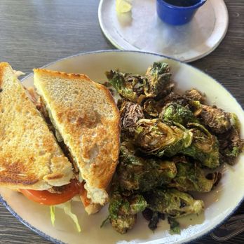 Tupelo Honey Southern Kitchen & Bar - Sweet & Spicy Fried Chicken Sandwich w/ Brussels - Southern Near Me - Asheville, North Carolina Tupelo Honey Southern Kitchen & Bar - Sweet & Spicy Fried Chicken Sandwich w/ Brussels - Southern Near Me - Asheville, North Carolina