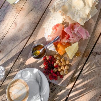 Tiny Boxwoods - Cheese and Meat Board and a Caramel Latte - New American Near Me - Houston, Texas Tiny Boxwoods - Cheese and Meat Board and a Caramel Latte - New American Near Me - Houston, Texas