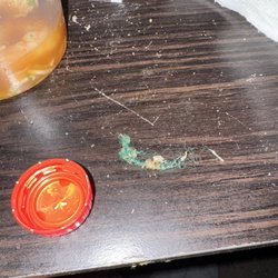 Lemon Garden Restaurant - This piece of green fiber came in our fried rice order! Besides the bad attitude from the lady who takes the orders.