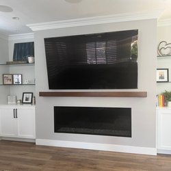 Exquisitech Audio Visual - 85" TV in the family room.