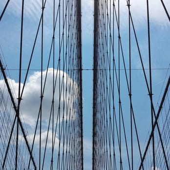 Brooklyn Bridge - A view up at the suspension system and diagonal stay cables. - Landmarks & Historical Buildings Near Me - Brooklyn, New York Brooklyn Bridge - A view up at the suspension system and diagonal stay cables. - Landmarks & Historical Buildings Near Me - Brooklyn, New York