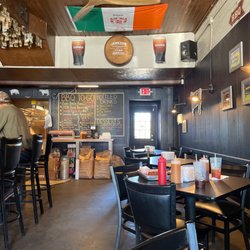 M. Clancy’s BBQ & Pub Fare - Menu and dining area