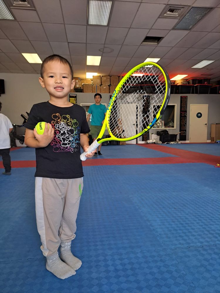 Tom Vo's Youth Sports Logo