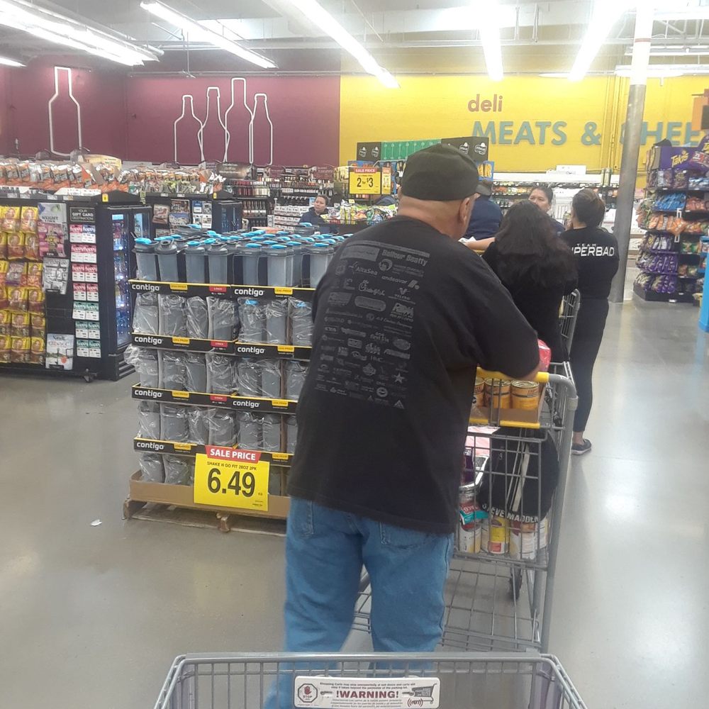 To check stands open for 20 people in line ridiculous bunch of people just Milling around that could be helping customers