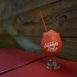 a drink in a glass on a table