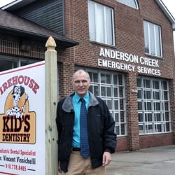 Firehouse Kid's Dentistry - Dr.Visichelli outside the ddental office from the fayetteville observer.