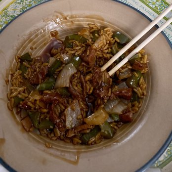 Top’s China - a bowl of rice with chopsticks - Chinese Near Me - Virginia Beach, Virginia