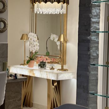 Signature Design Center - a marble vanity with gold accents - General Contractors Near Me - Anaheim, California Signature Design Center - a marble vanity with gold accents - General Contractors Near Me - Anaheim, California