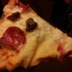 Domino's Pizza - Ordered extra sauce. This piece has barely any sauce. Most of the pizza was with no sauce.