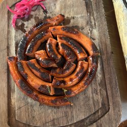 La Vaca Argentina - Chorizo asado and pickled onion