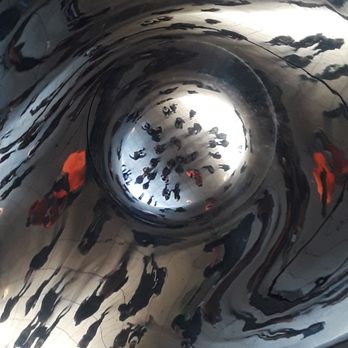 Cloud Gate - A very trippy, VERY cool photo as taken from the absolute center of the walk-under. Whaaaaaat - Public Art Near Me - Chicago, Illinois Cloud Gate - A very trippy, VERY cool photo as taken from the absolute center of the walk-under. Whaaaaaat - Public Art Near Me - Chicago, Illinois