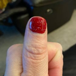 Pro Nails & Spa - This is what it look like after she finished 45.00 after. Never again, I will stick with my regular place.