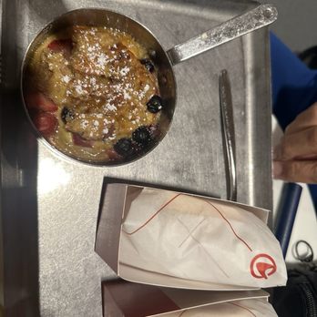 Capital One Lounge - 3/17/2025 Steel Cut Oats with cherry, apple, and pineapple compote. - Airport Lounges Near Me - Dulles, Virginia