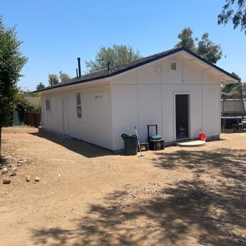 Westline Construction - a white building with a black roof - General Contractors Near Me - Anaheim, California Westline Construction - a white building with a black roof - General Contractors Near Me - Anaheim, California