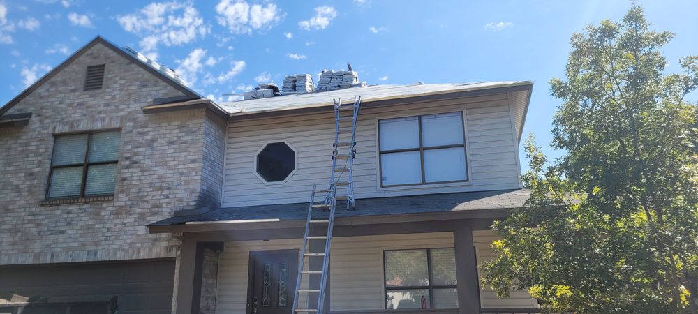 Slide of Big Boy Roofing