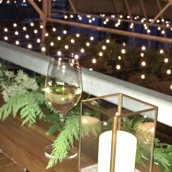 Honor Flowers - Sprawling greens along the bar area. - Florists Near Me