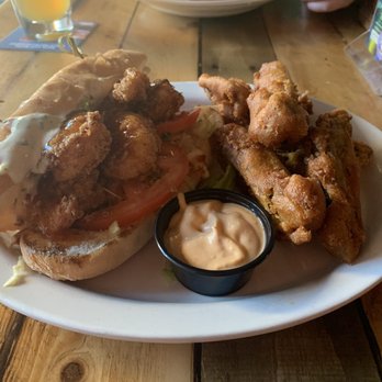 The Walrus - Shrimp poboy with the mushroom fries - Bars Near Me - Columbus, Ohio