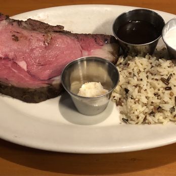 Black Angus Steakhouse - Prime Rib 12oz (Medium Rare), Rice Pilaf, Fresh Horse Radish and Creamy Horse Radish, and Au Jus sauce - Steakhouses Near Me - Montclair, California