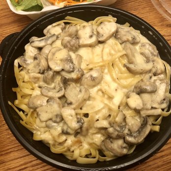 Victorias Italian Cuisine - a plate of pasta and mushrooms - Italian Near Me - Appleton, Wisconsin Victorias Italian Cuisine - a plate of pasta and mushrooms - Italian Near Me - Appleton, Wisconsin