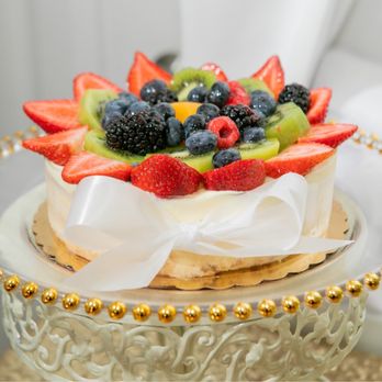 Bellash Bakery - a cake with fruit on top - Bakeries Near Me - Woodbridge, Virginia