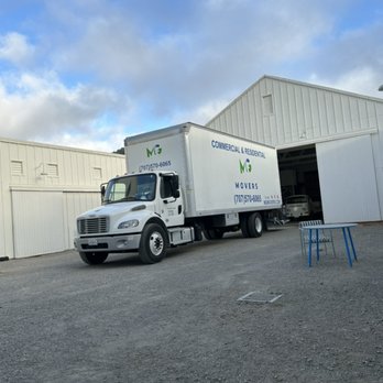 Mg Movers - Loading large heavy wood cabinets - Movers Near Me - Santa Rosa , California